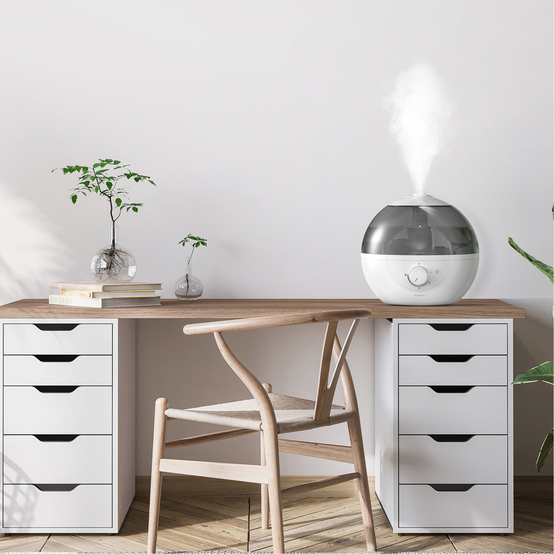 image shows Homedics® Ultrasonic Humidifier CMTF32 placed on the table