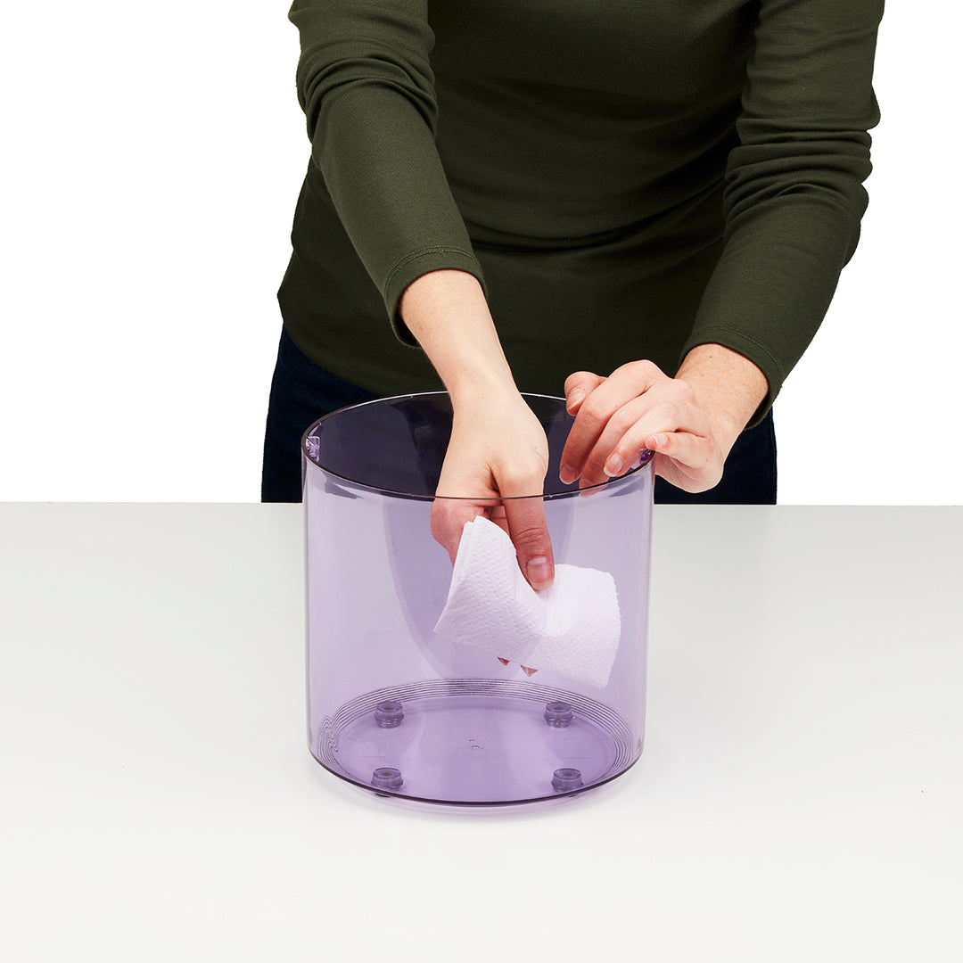 Lilac | Customer cleans water tank of the Homedics TotalComfort UV-C Ultrasonic Humidifier