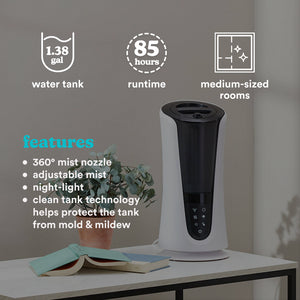 Homedics TotalComfort Deluxe Warm and Cool Mist Ultrasonic Humidifier sitting on table in home