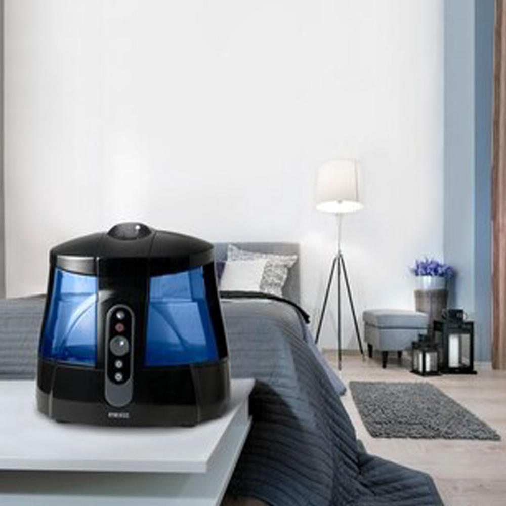 Homedics TotalComfort Humidifier Plus on table in bedroom