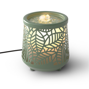 Decorative lamp with leaf pattern on a white background