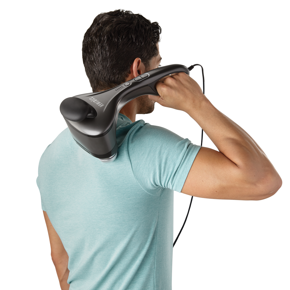 Mah holds Homedics Dual Temp Percussion Pro Hot and Cold Massager on back