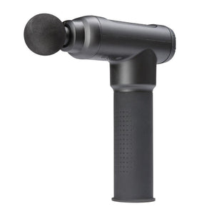 Woman sitting on floor opens carrying case for the Homedics Therapist Select Pro Percussion Massager