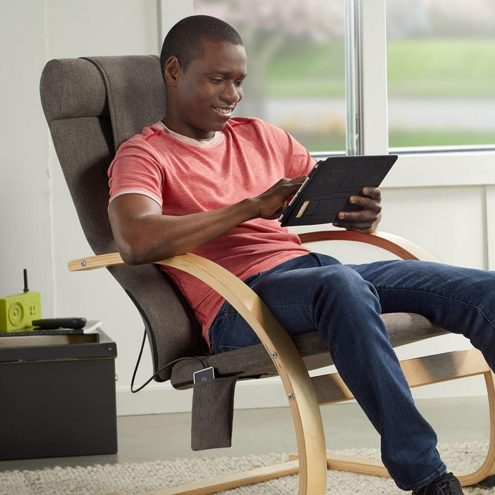 Man sits in chair and enjoys a massage from the Homedics 3D Shiatsu Massaging Lounger