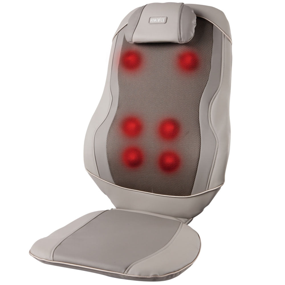 Woman sits in chair while enjoying a massage from the Triple Shiatsu Pro 3D Kneading Massage Cushion on Chair