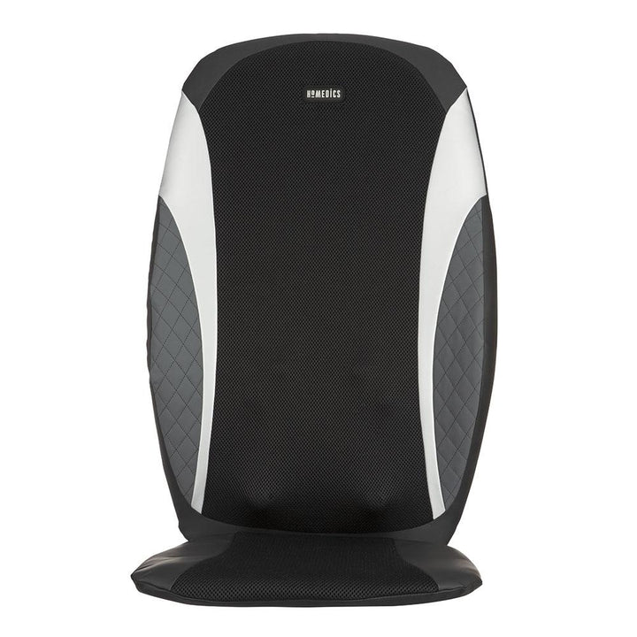 Woman looks at controller and relaxes in chair while enjoying a massage from the Homedics 8-Node Shiatsu Plus Massage Cushion with Soothing Heat