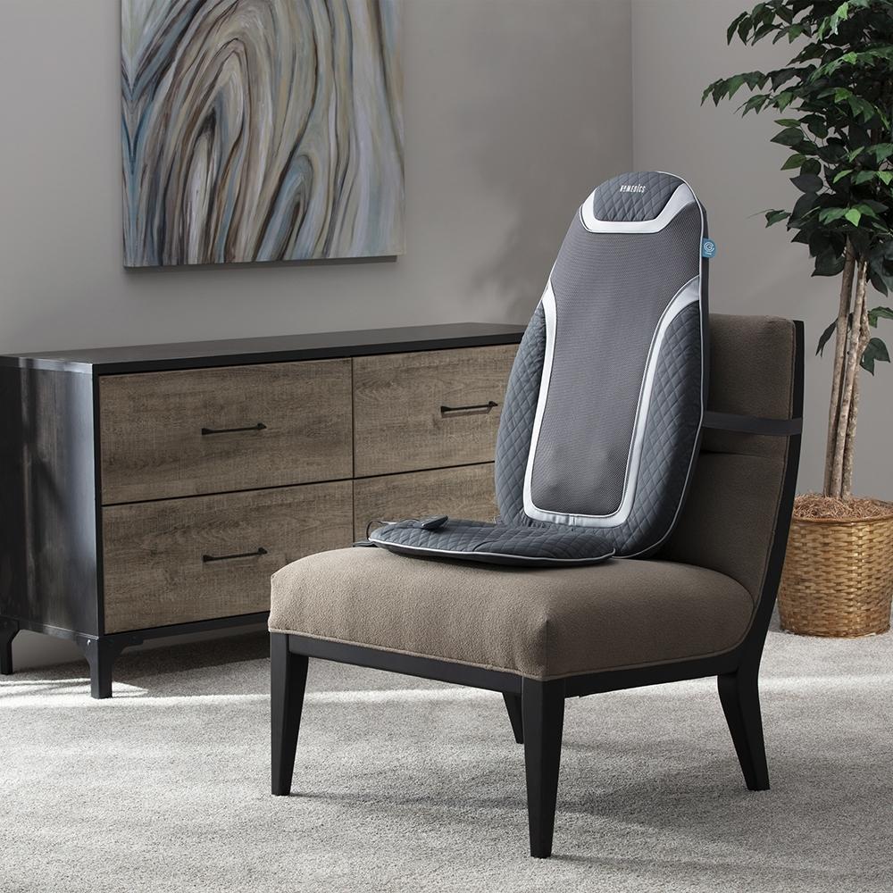 Angled view of the Homedics Gentle Touch Gel Shiatsu Massage Cushion with Heat on chair