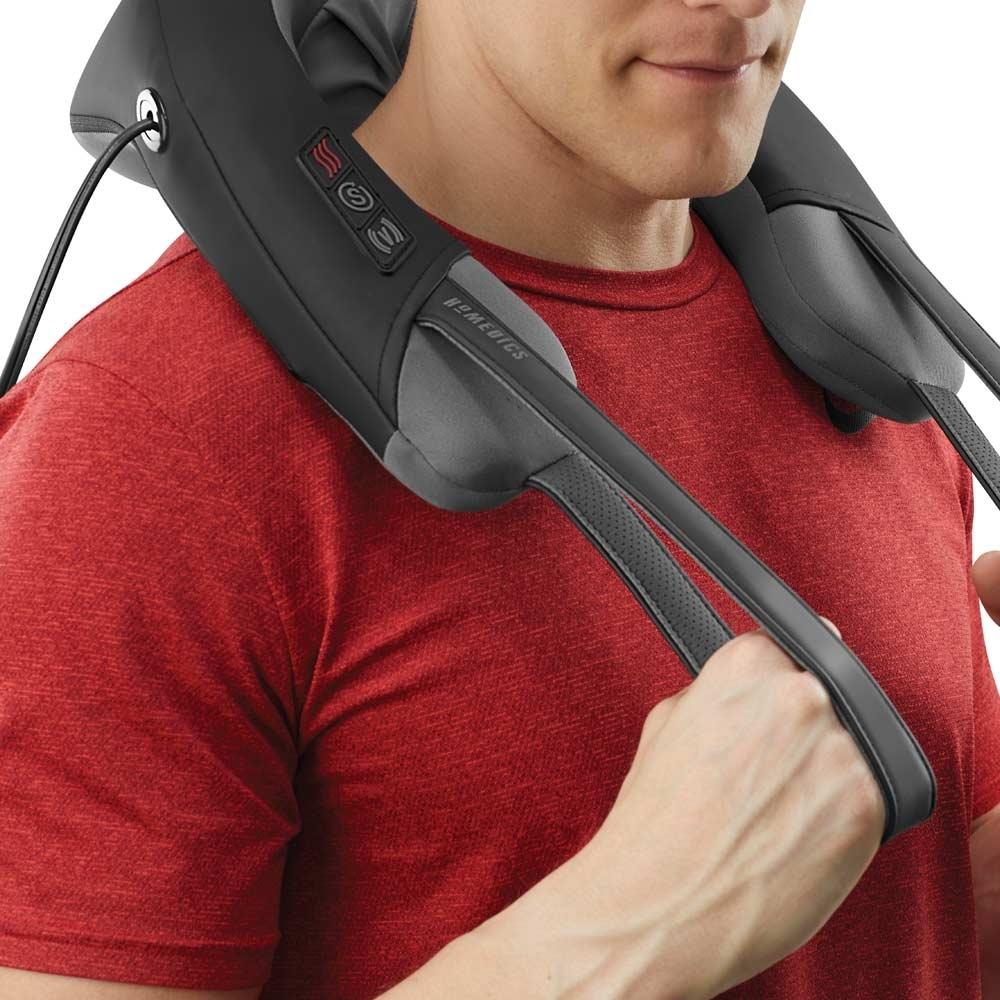 Man in red shirt enjoys neck massage from the Homedics Pro Therapy Elite - Shiatsu and Vibration Neck Massager with Heat