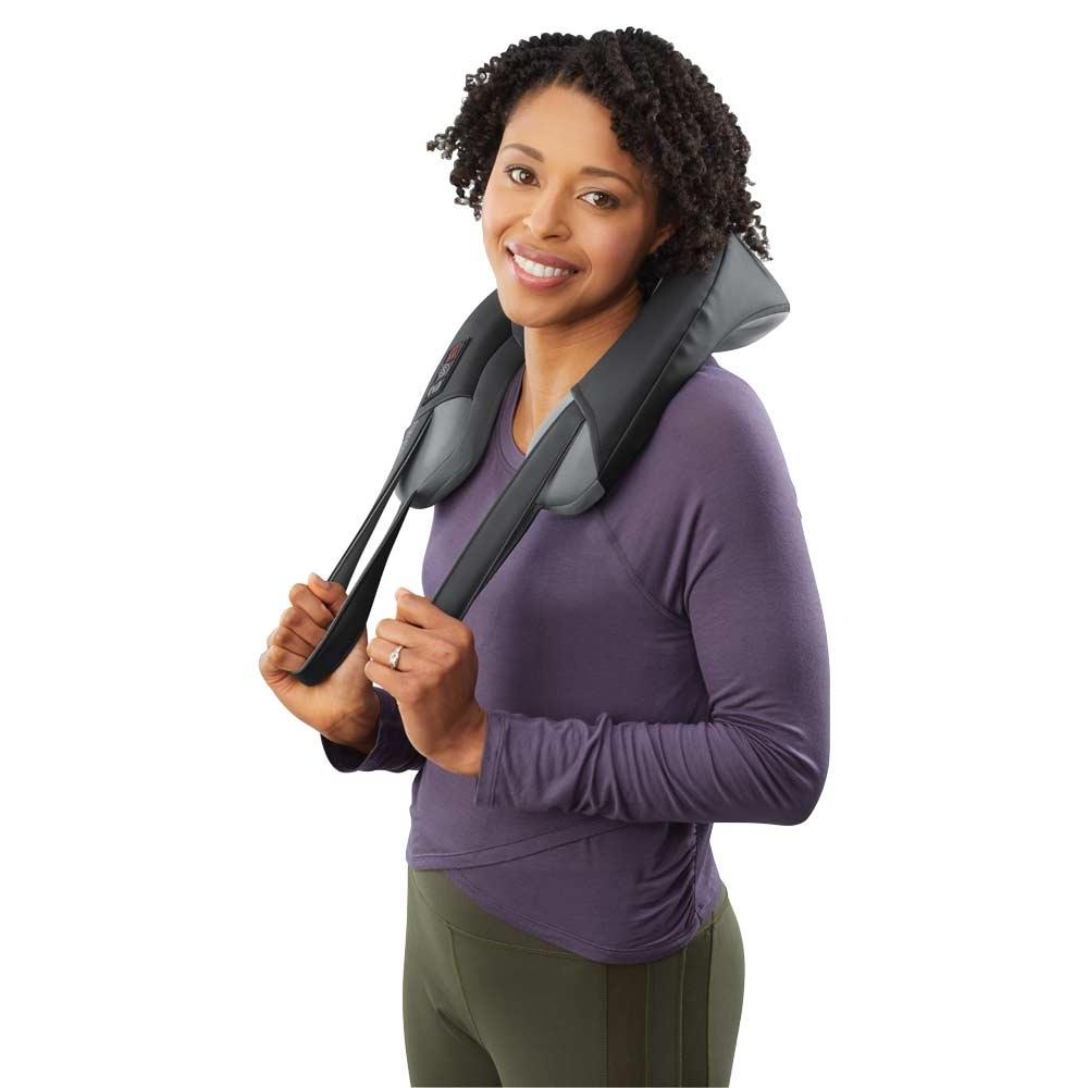 Woman stands and smiles while receiving neck massage from the Homedics Pro Therapy Elite - Shiatsu and Vibration Neck Massager with Heat