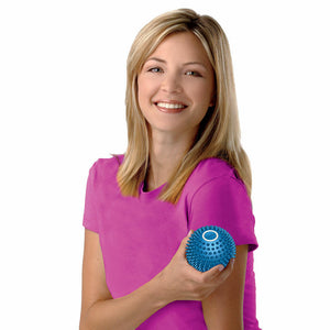 Smiling woman holds the Homedics Vibration Accu-Node Massager