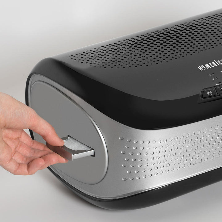 Black | Close-up view of essential oils tray on the black Homedics TotalClean Desktop Air Purifier