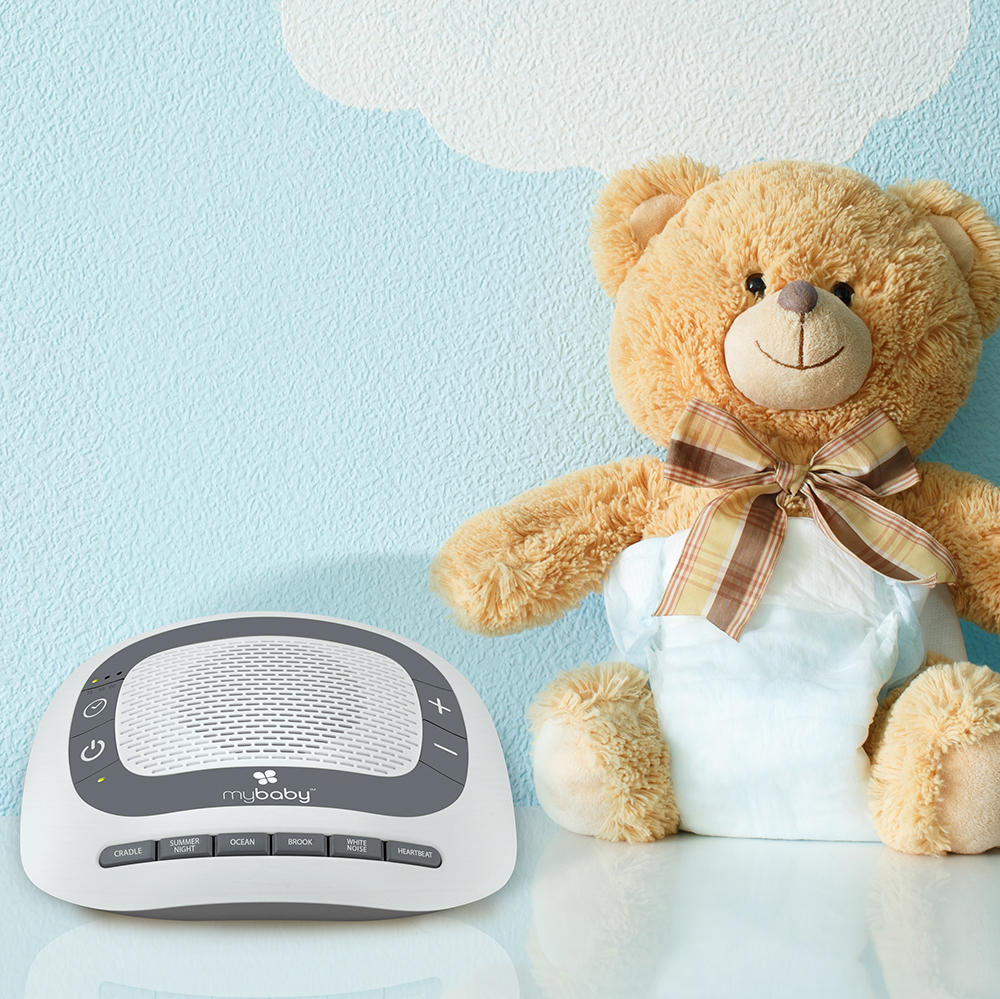 Front view of the Homedics MyBaby SoundSpa Portable next to teddy bear