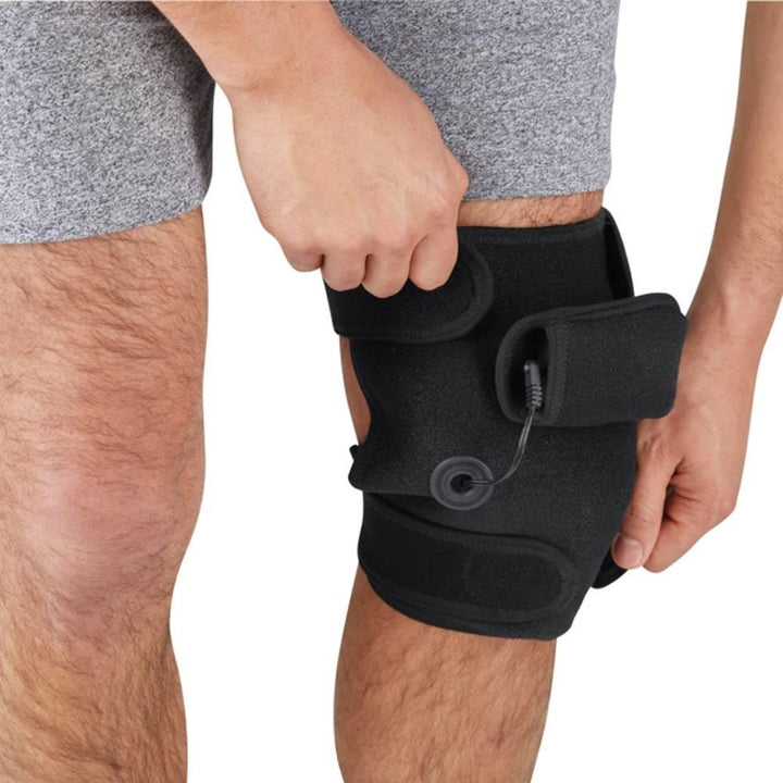 Man wears the Homedics Cordless Body Wrap with Heat and Vibration on left knee