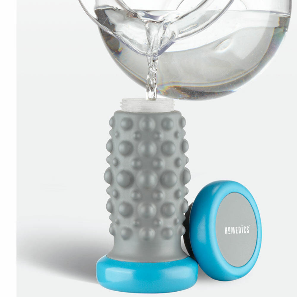 Pouring water into the Homedics Hydra Vibration Foot Massager