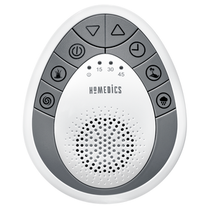 Woman reaches towards Homedics SoundSpa Mini Portable Sound Machine from bed