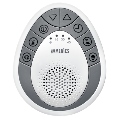 Woman reaches towards Homedics SoundSpa Mini Portable Sound Machine from bed