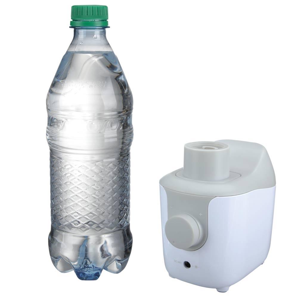 Homedics TotalComfort Portable Humidifier next to water bottle