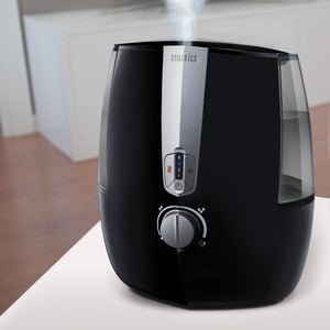Angled view of the Homedics TotalComfort Plus Ultrasonic Humidifier active
