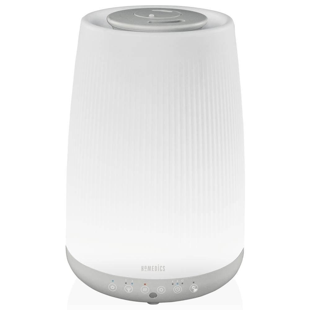 Close-up of hand on controls for the Homedics TotalComfort Ultrasonic Humidifier