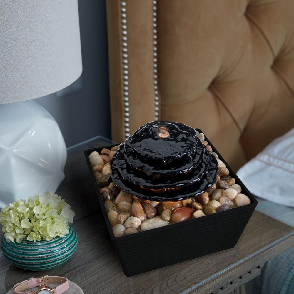 Homedics Envirascape Entrance Tabletop Relaxation Fountain on night stand next to bed
