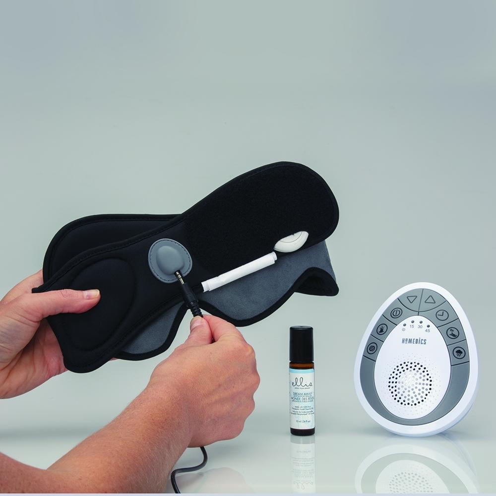 Hand plugs in headphone adapter to the Homedics Relax and Unwind Spa Kit